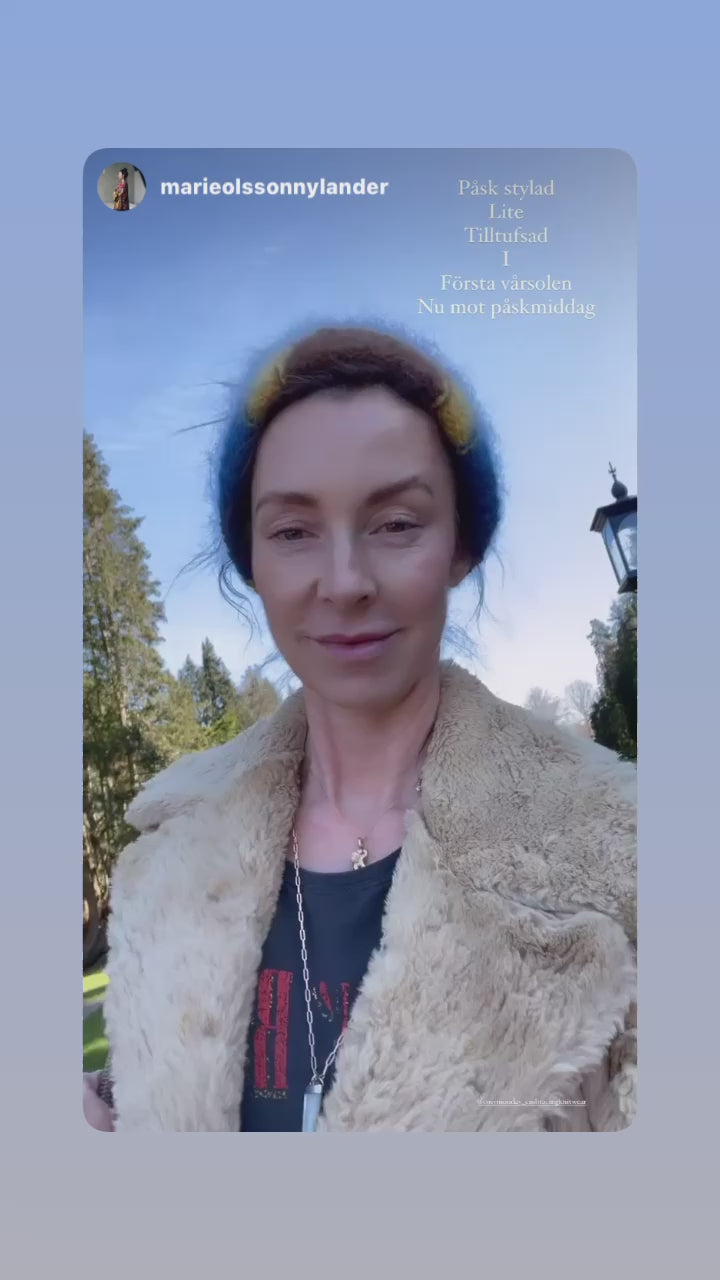 Marie Olsson Nylander med bohemsk lue